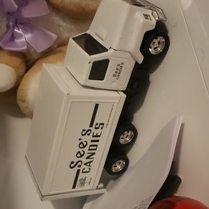 See's candies vintage white truck with back door that can open